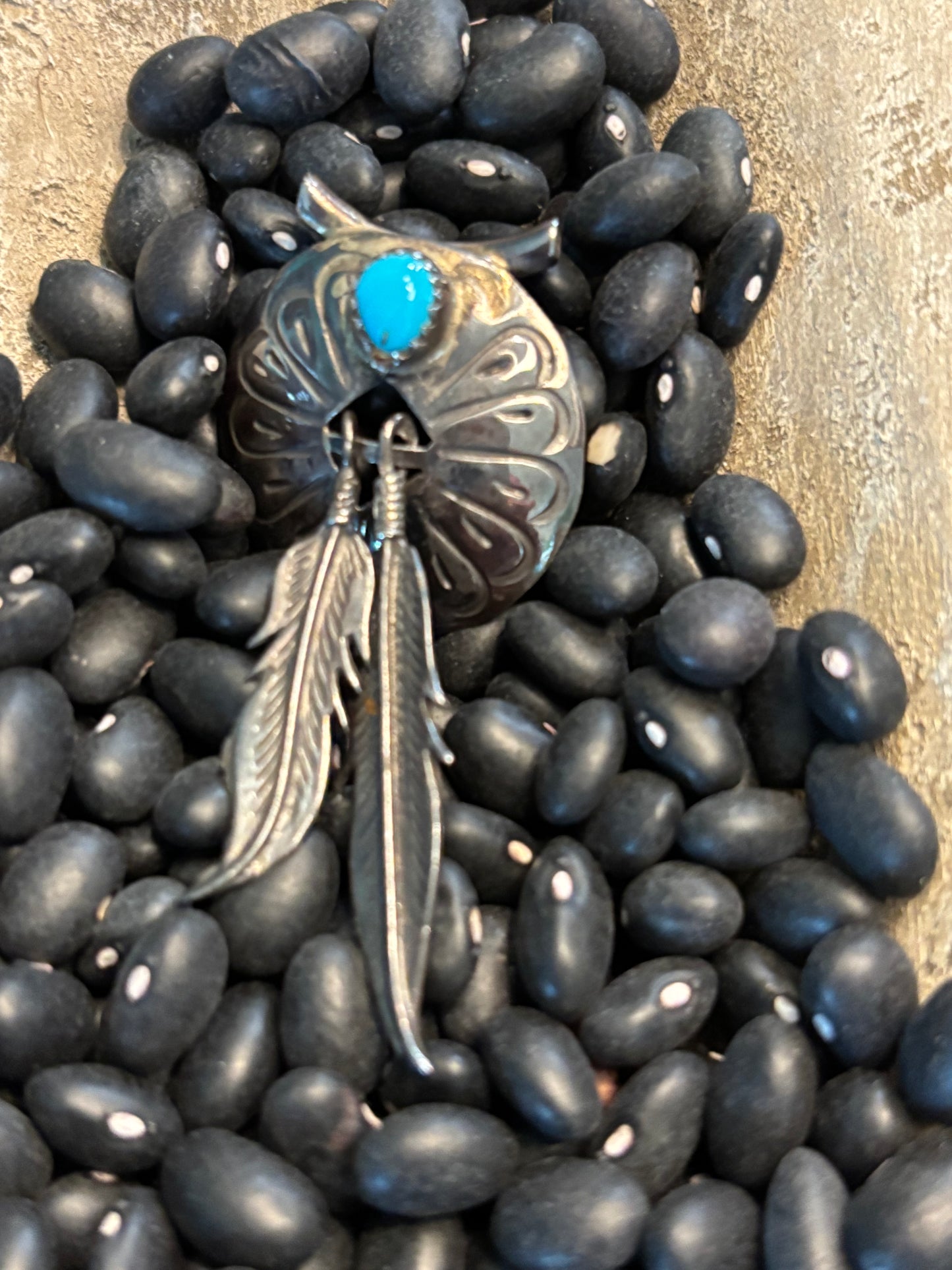 NA Charm with Feathers