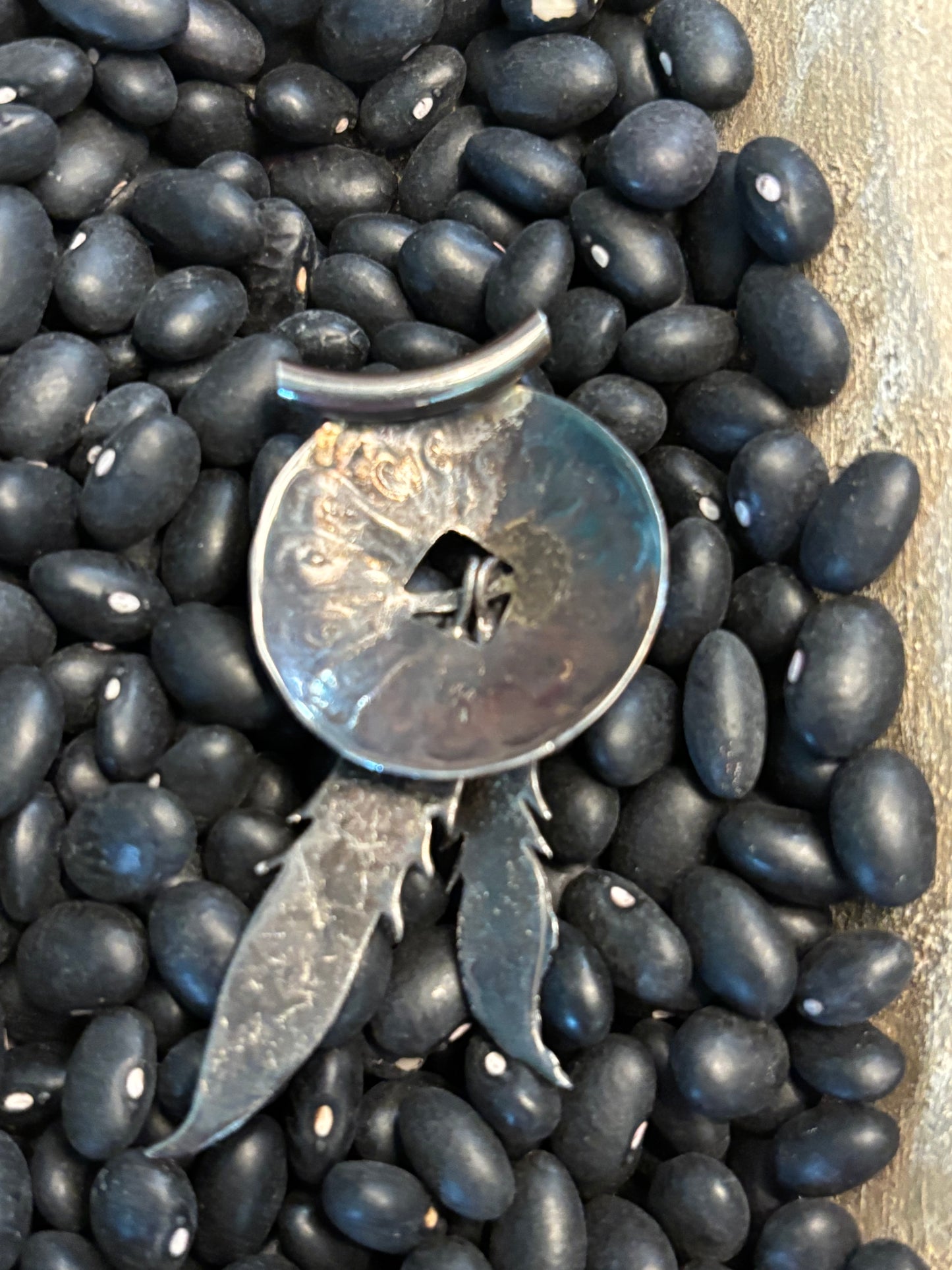 NA Charm with Feathers